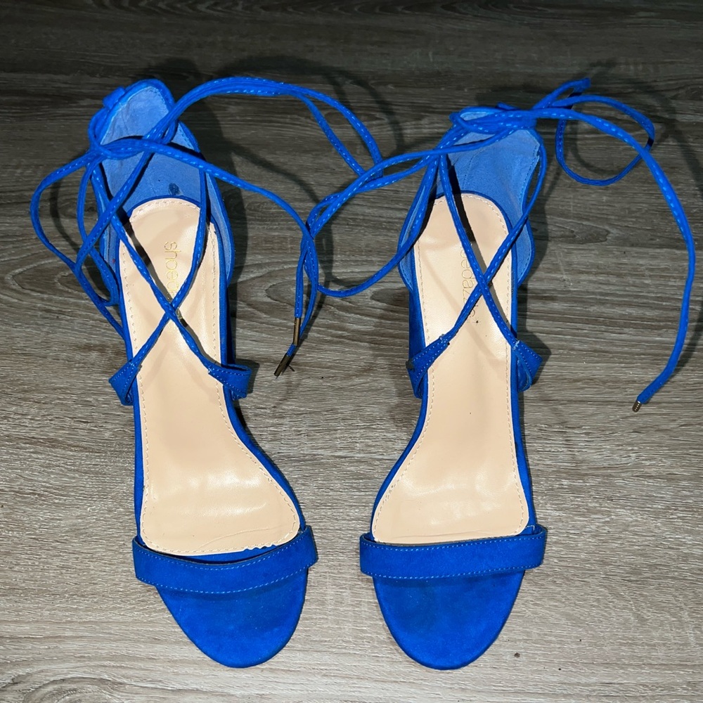 Royal blue, strappy high heels. Chunky platform and open toe